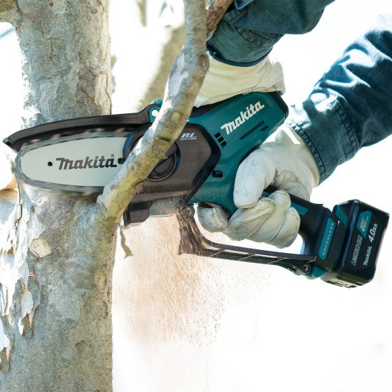 Makita UC100DZ tronçonneuse Noir, Bleu